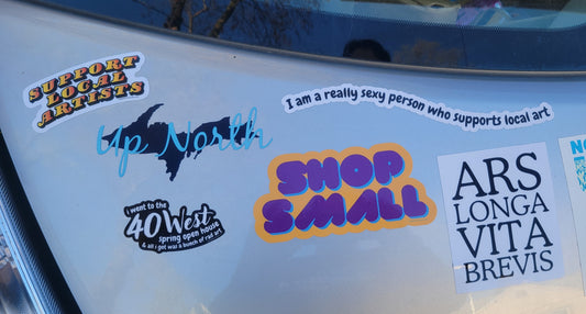 Weatherproof vinyl Support Local Artists sticker by InkBird Print Studio LLC, bold white on black, 3-inch adhesive for cars and laptops.