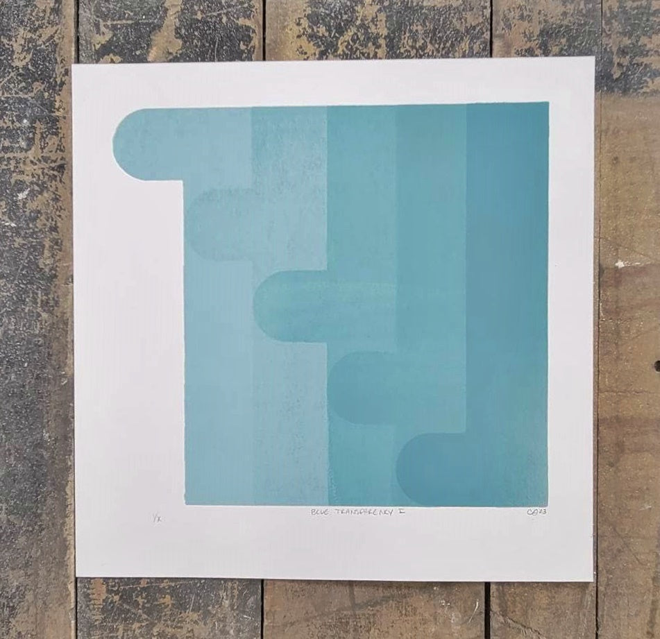 Set of 3 blue geometric screen prints on white, hand-pulled by InkBird Print Studio, textured wood base, stepped rectangle design.