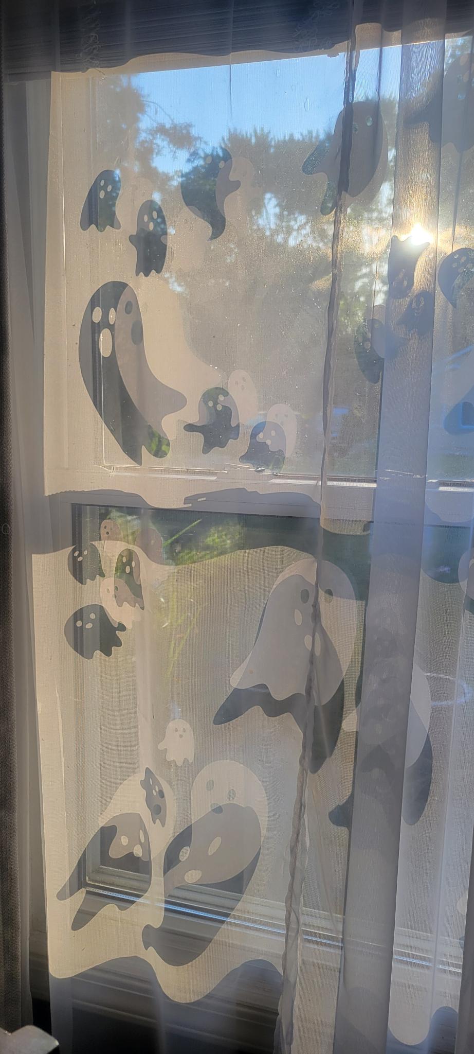 Ghosts Static Cling Set by InkBird Print Studio: semi-transparent vinyl decals, no adhesive, white ghost shapes for windows, reusable.