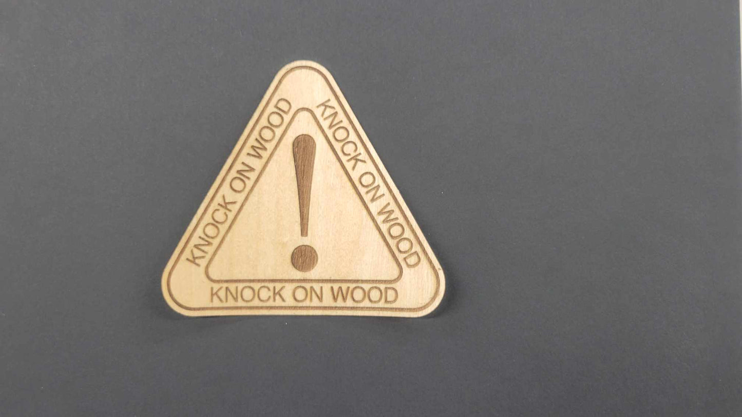 Triangular wood veneer sticker by InkBird Print Studio, laser-cut with exclamation mark and “KNOCK ON WOOD” on each side.