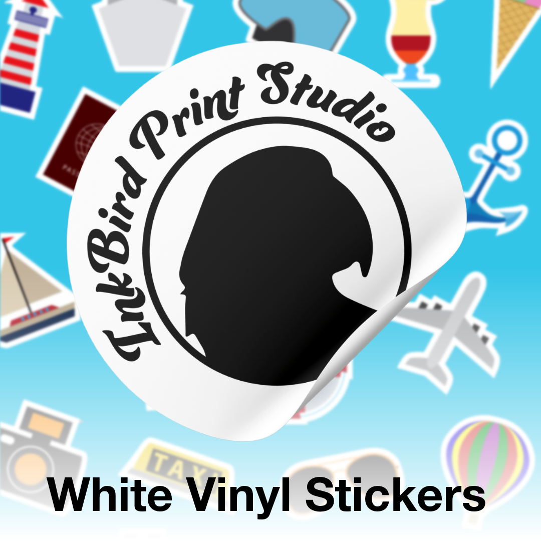 A white vinyl sticker shown on a blue background with scattered travel-themed stickers around it. The main sticker has a black silhouette profile and the text 'InkBird Print Studio.