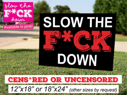 Pink 18x24 vinyl yard sign with stake, bold Slow The F*ck Down in black lettering, partial censorship of the text, by InkBird Print Studio.