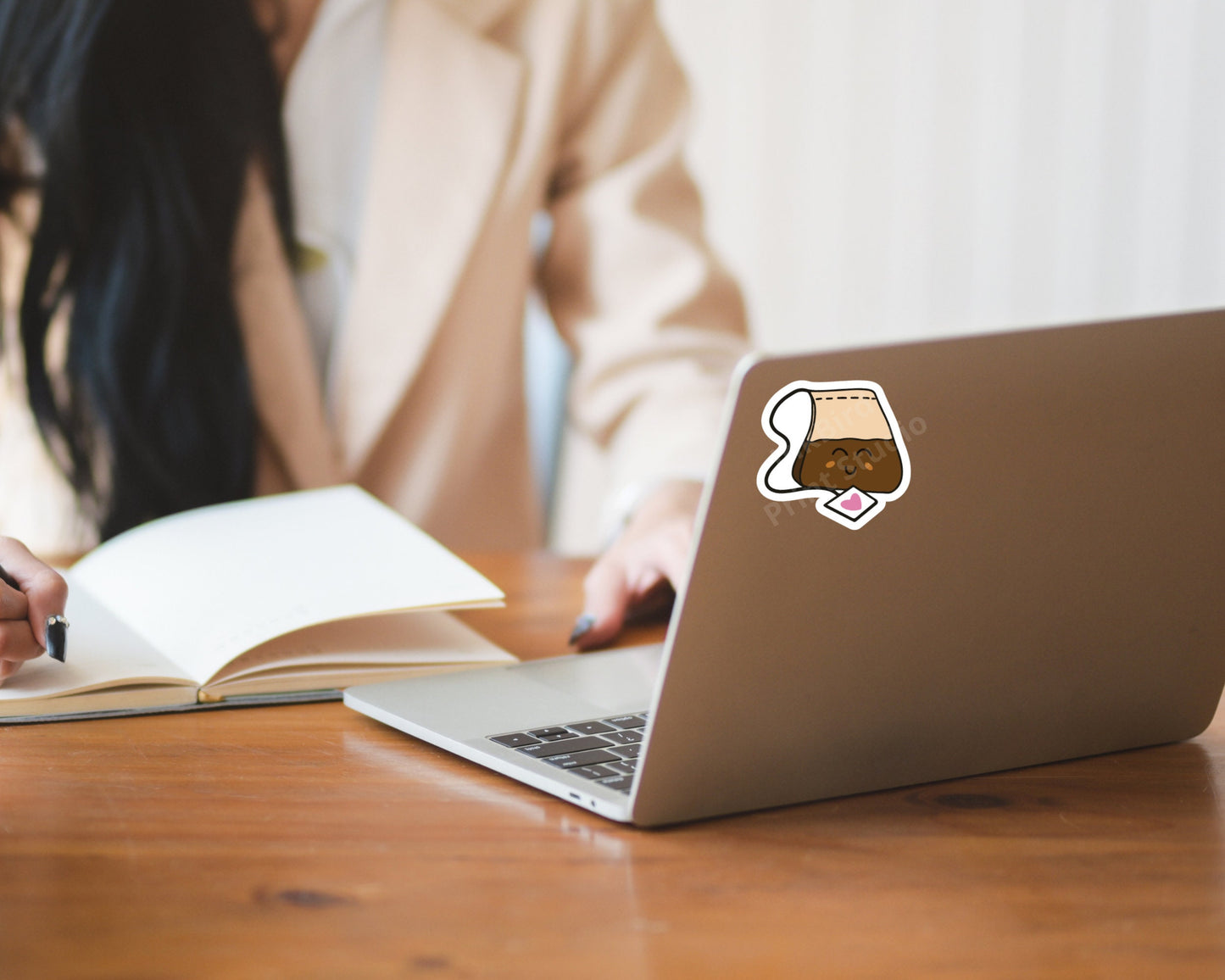 Adorable Happy Tea vinyl sticker by InkBird Print Studio, colorful die-cut on a laptop; adhesive, glossy finish, approx. 2 inches.